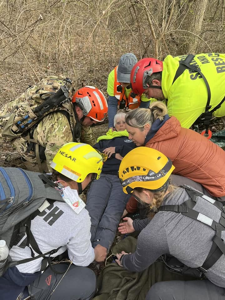 NESAR team caring for a located subject in the field during a search